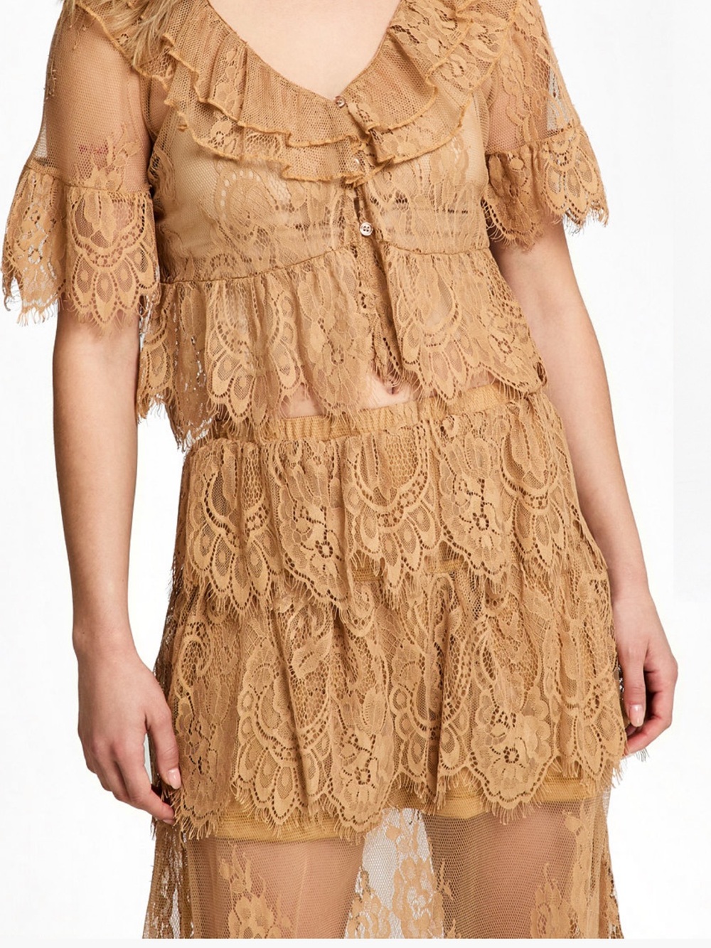 Two-piece lace set blouse and skirt.